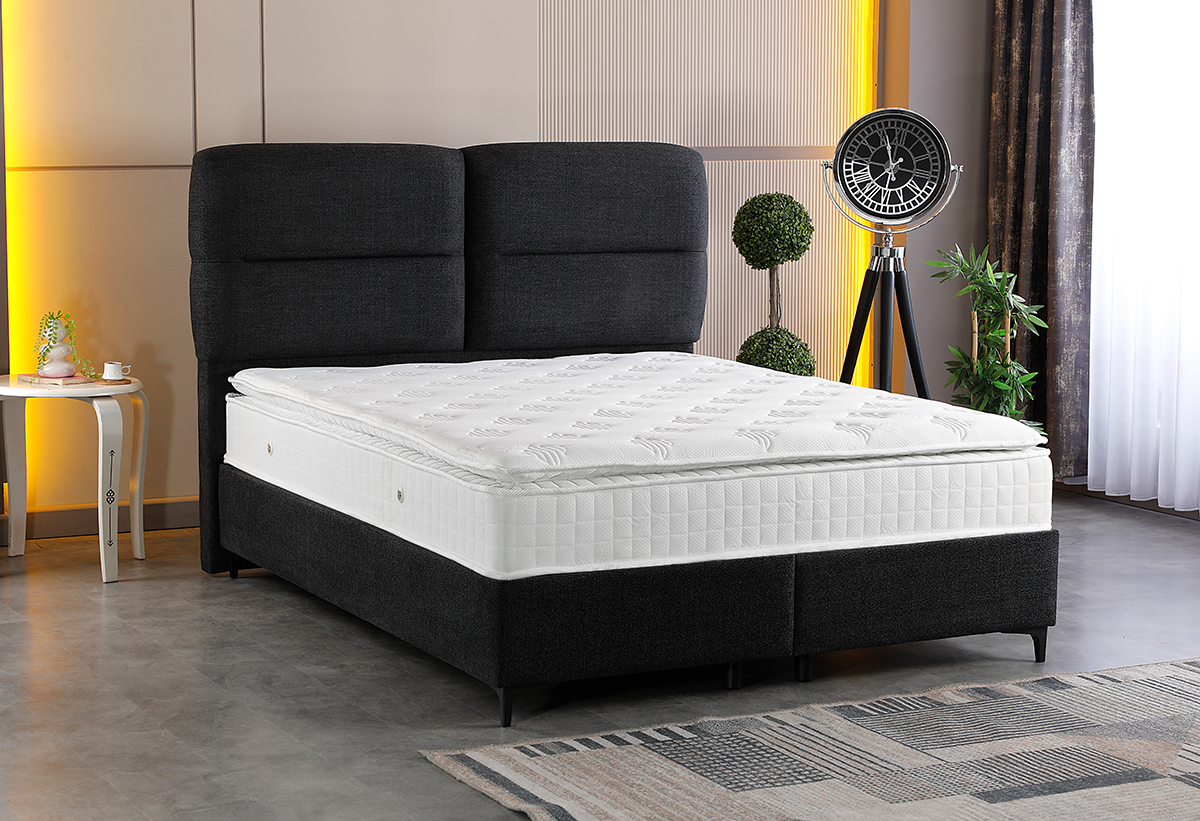 Απεικονίζεται το κρεβάτι με στρώμα. 